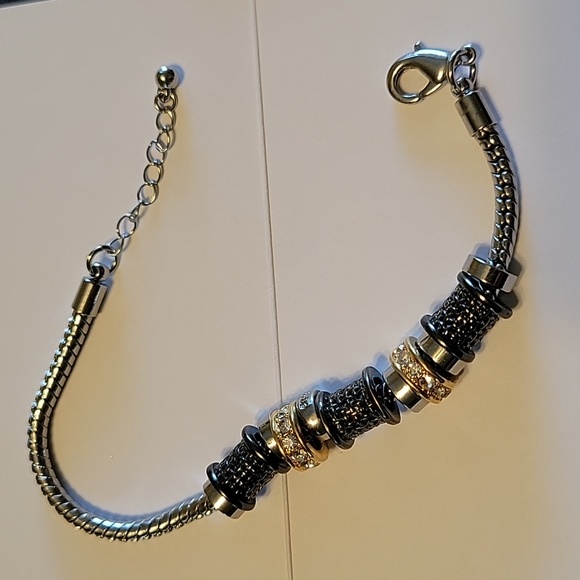 Source Unknown Jewelry - Silver chain with silver, gold, hematite & crystal beads adorn this bracelet